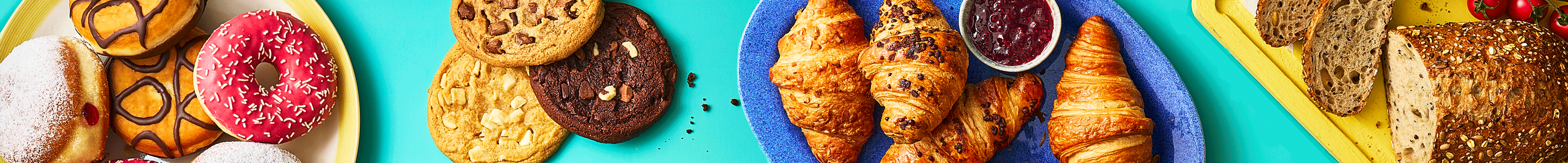 Donuts, cookies, croissants, and bread.