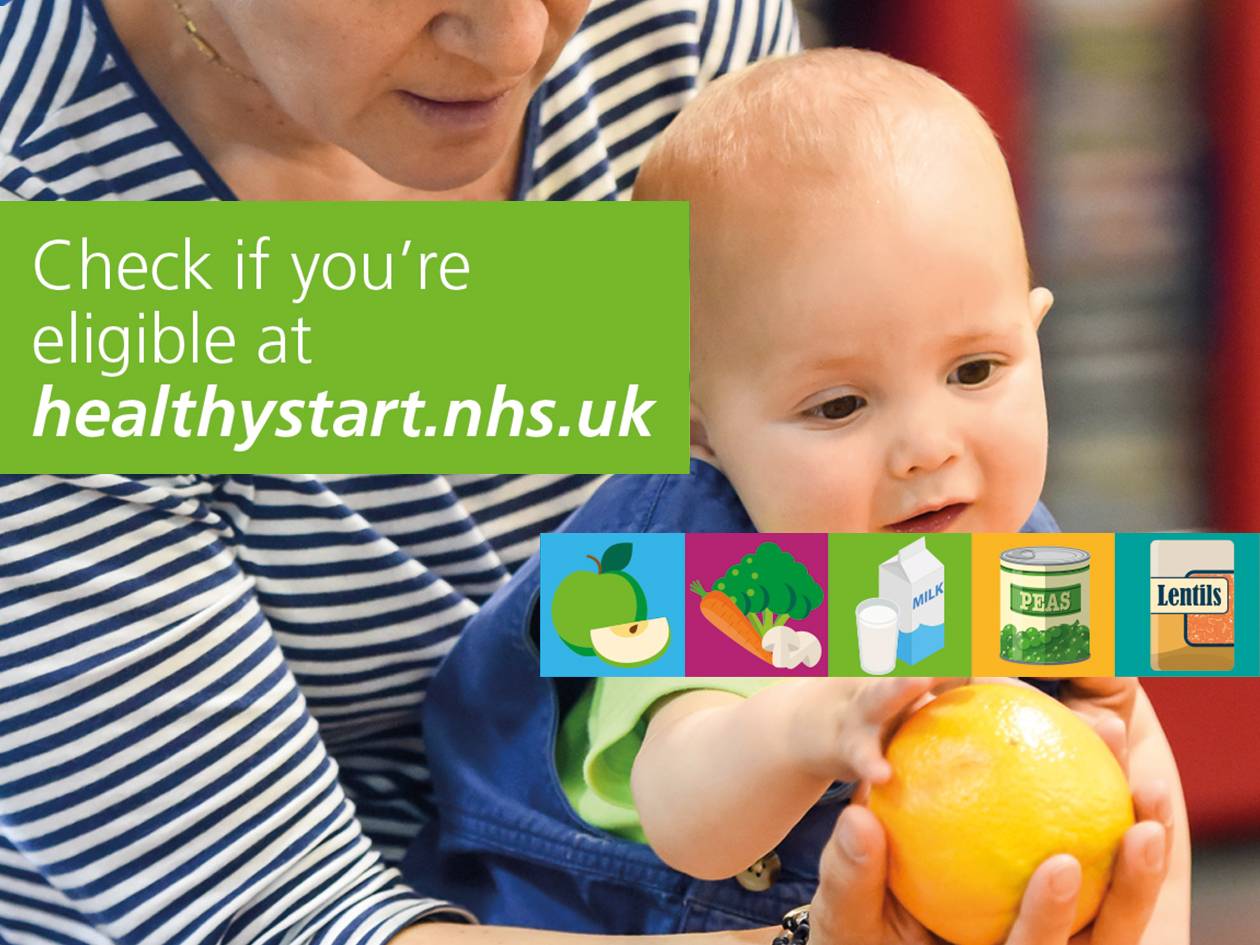 Baby with fruit, vegetables, milk and legumes. Check eligibility at healthystart.nhs.uk