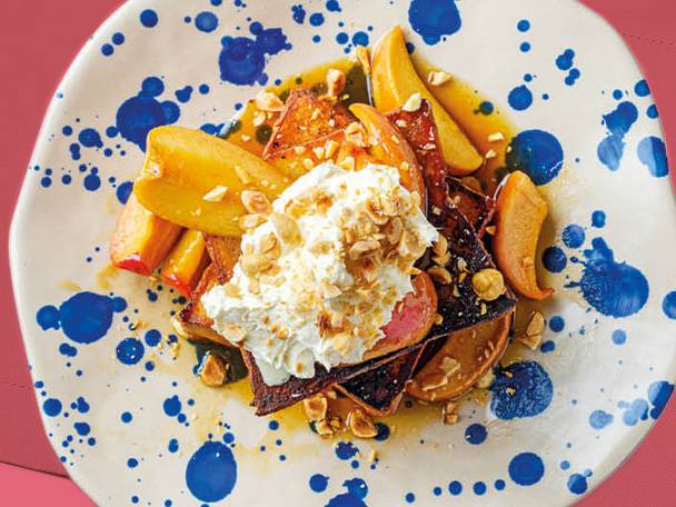 Sweet toast with apples, cream, and hazelnuts.