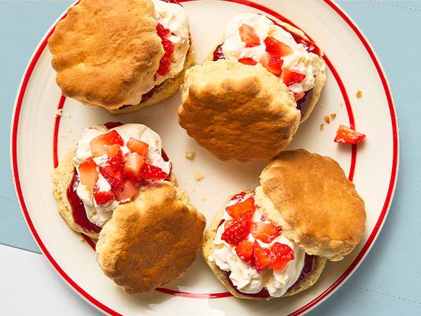 Scones with cream and strawberries.