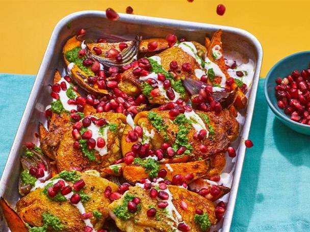 Roast chicken, sweet potatoes, and pomegranate.
