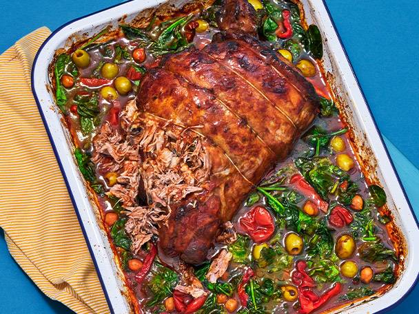 Roast lamb with spinach and olives.