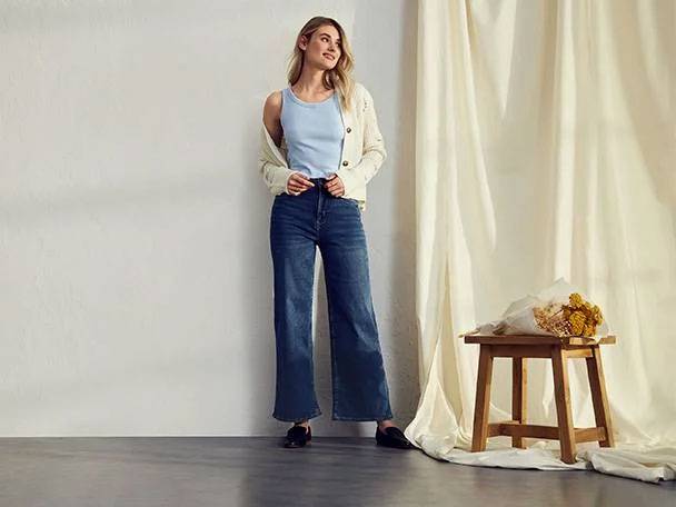 Jeans, top, and cardigan.